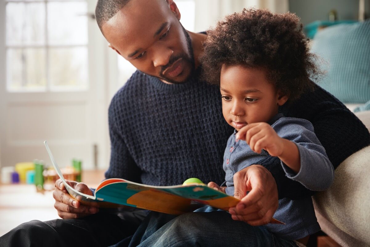 billboard-father-readng-with-young-boy