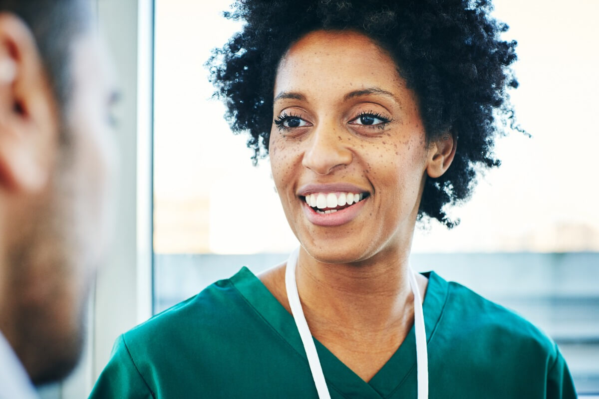 billboard-female-medic-smiling-in-scrubs