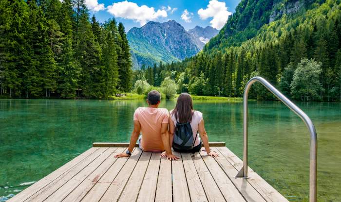 Couple sitting down and admiring nature Couple sitting down and admiring nature