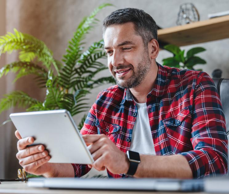 Male holding tablet Male holding tablet