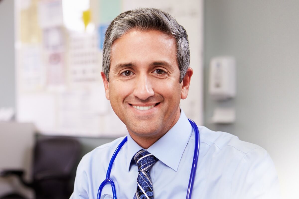 Smart male doctor smiling Smart male doctor smiling