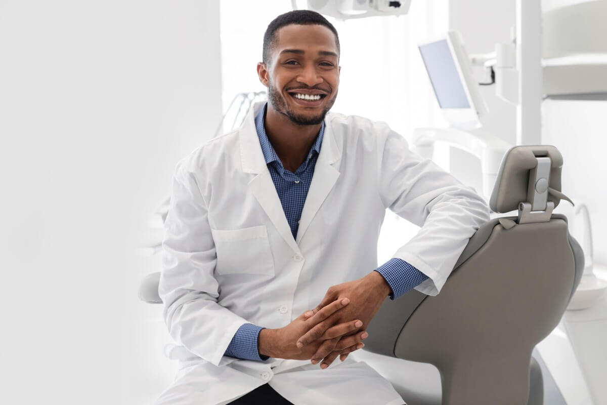Young male dentist smiling Young male dentist smiling