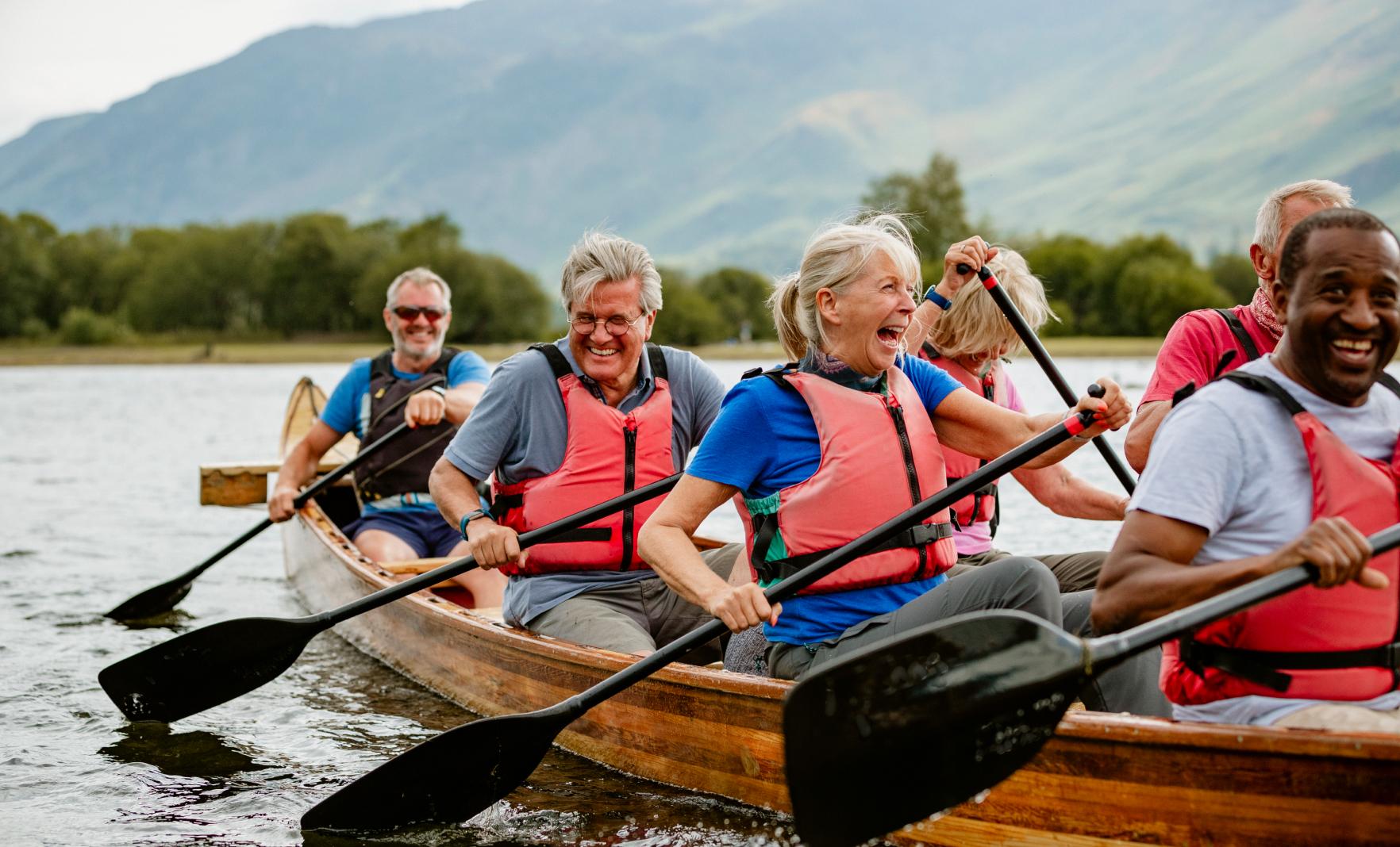 People canoeing on lake