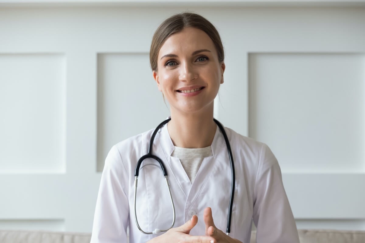 Young female medical professional with stethoscope Young female medical professional with stethoscope