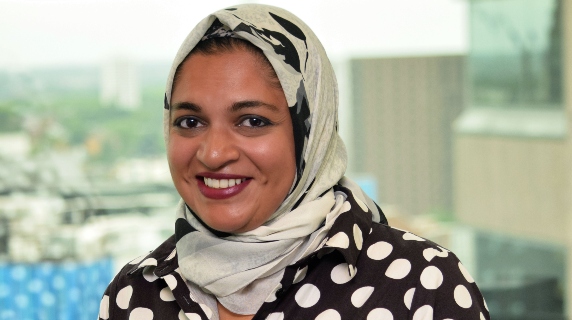 card-sabena-jameel Sabena Jameel smiling in Wesleyan office