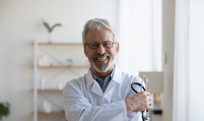 Male doctor smiling