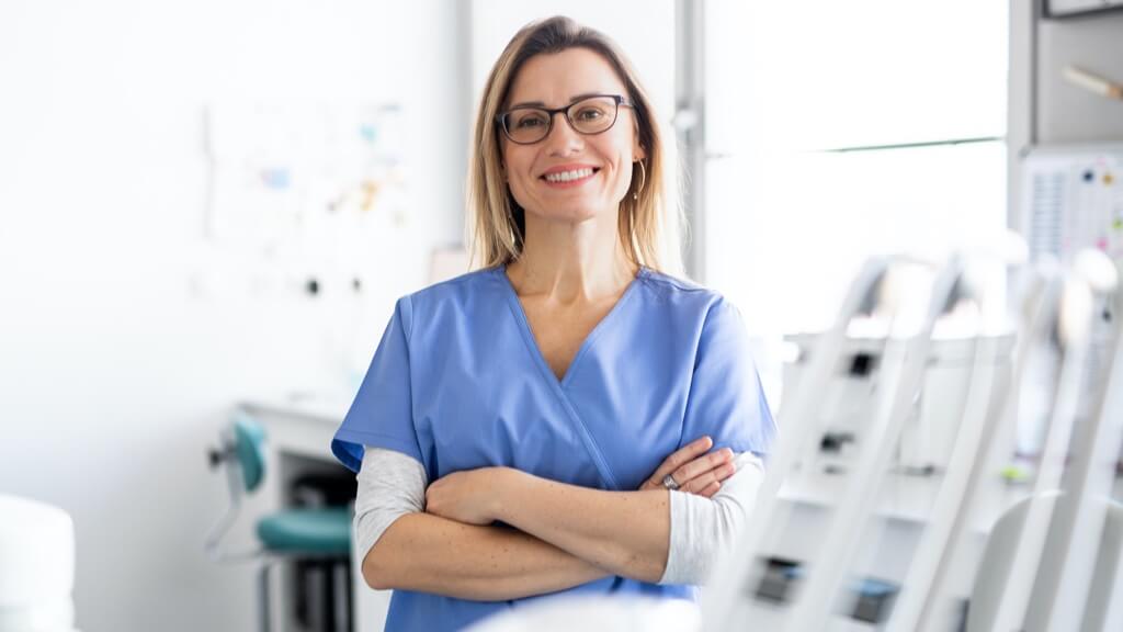 Female dentist wearing glasses
