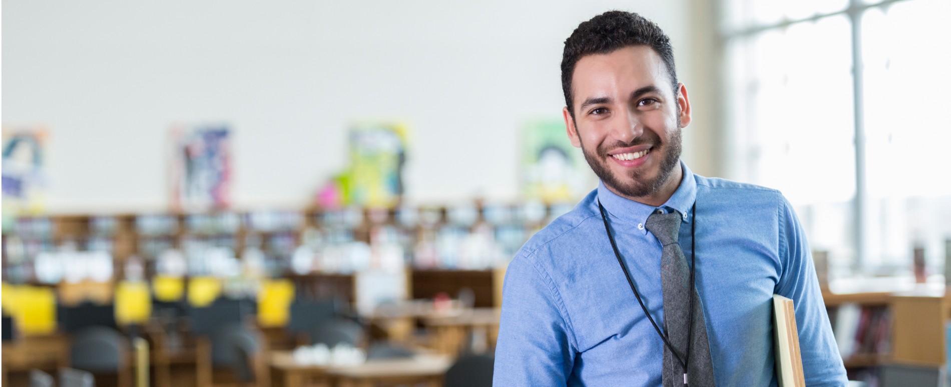 Male teacher smiling