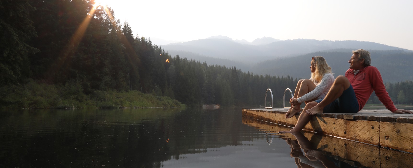 Couple looking over lake