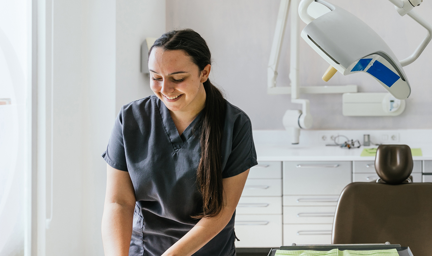 Female dentist in dental office