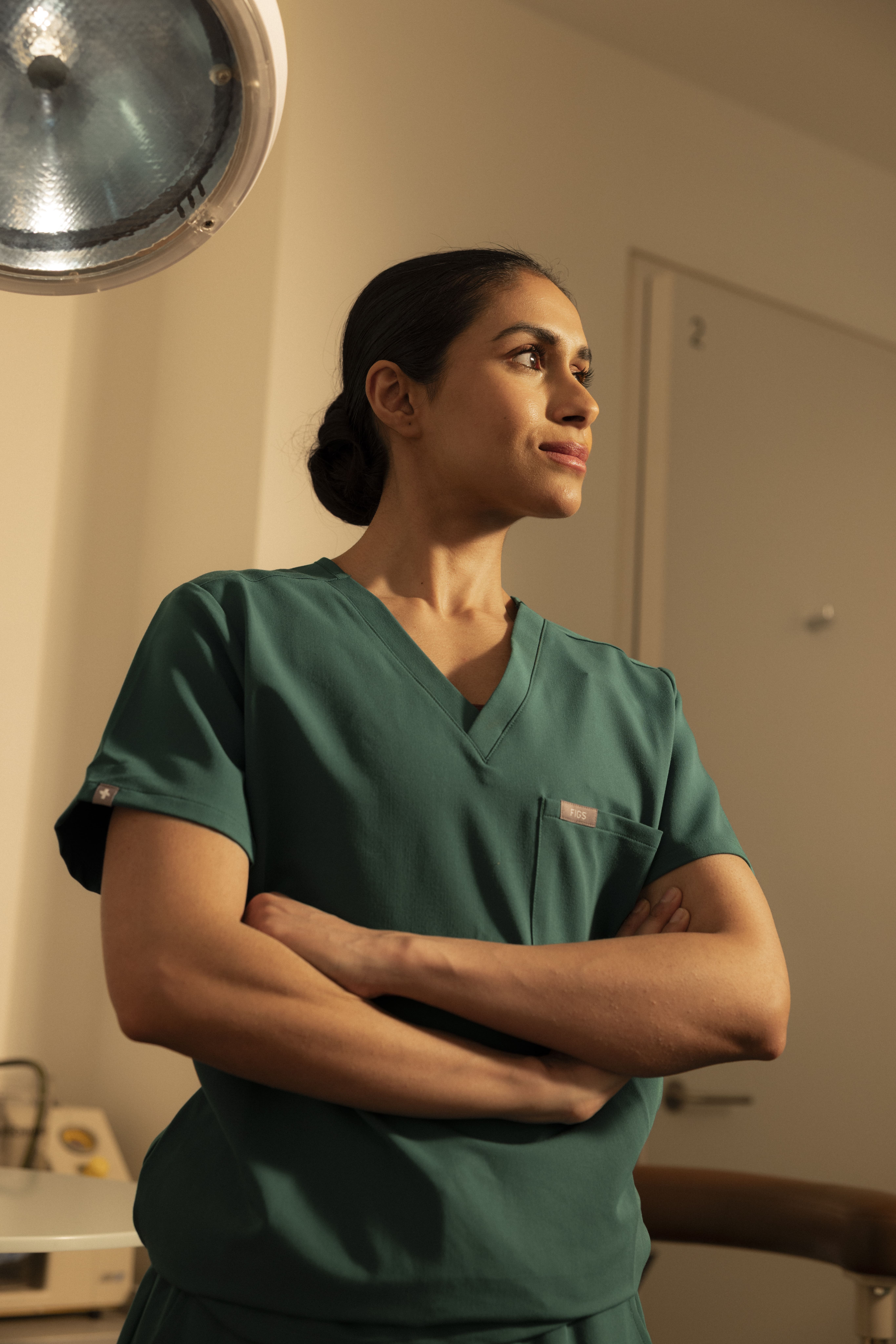 Female dentist with arms crossed