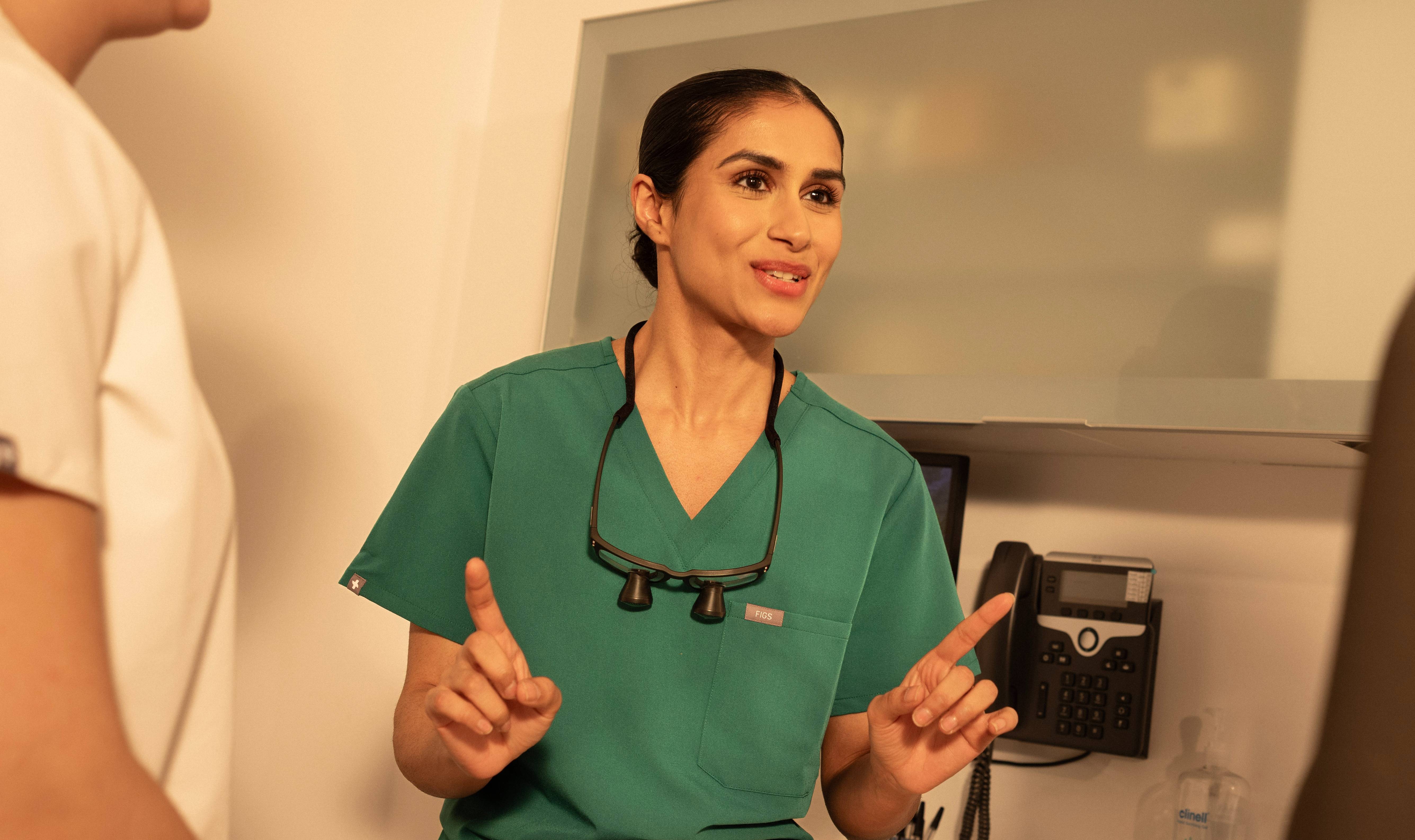 Female dentist explaining topic