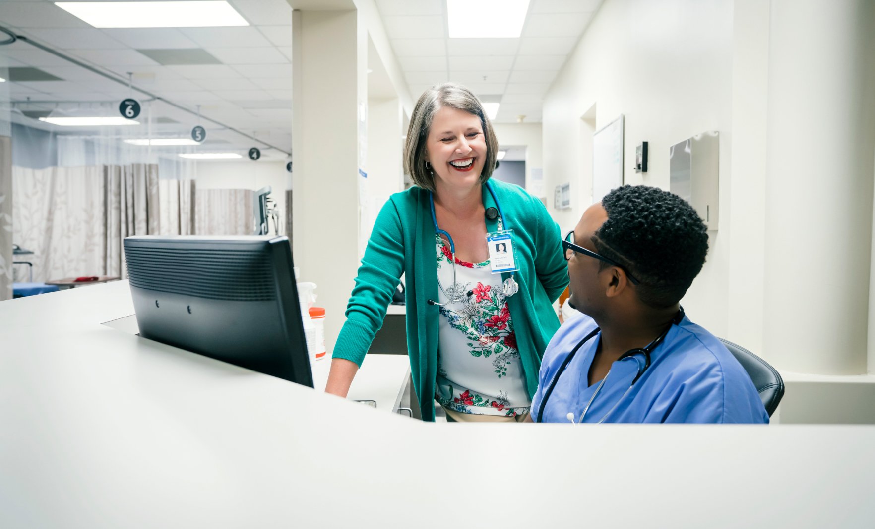 Female doctor and male medic talking